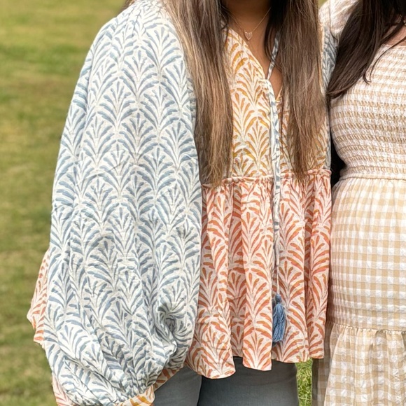 JUST STOPPING BY SPICED CORAL MULTI PRINT TOP
Red Dress Boutique - Picture 2 of 5